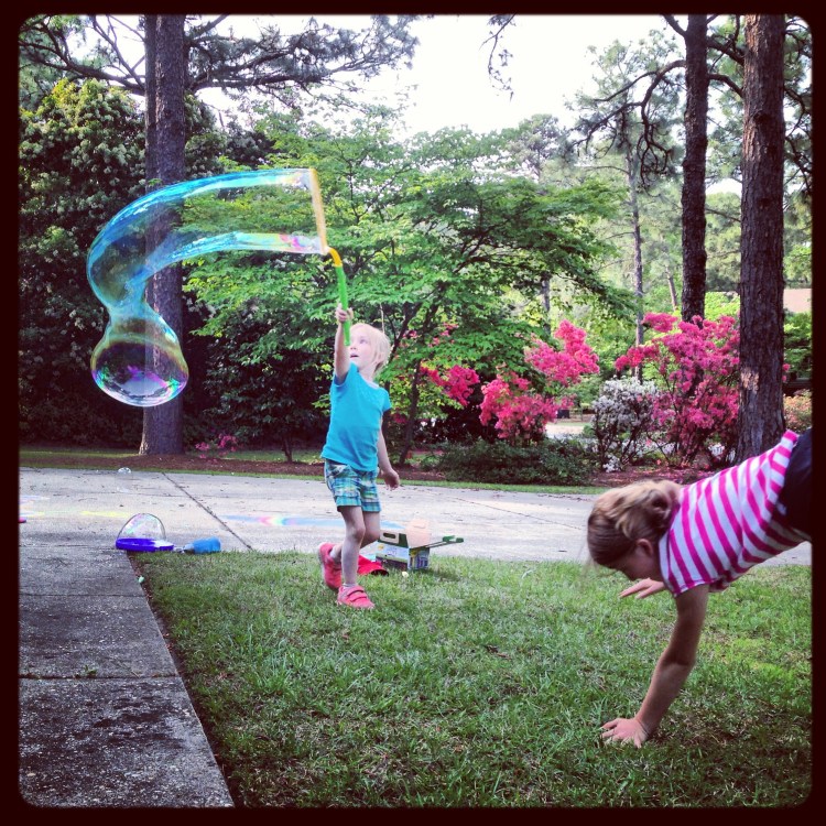 homeschool break, spring break, kids playing in yard Not So SAHM