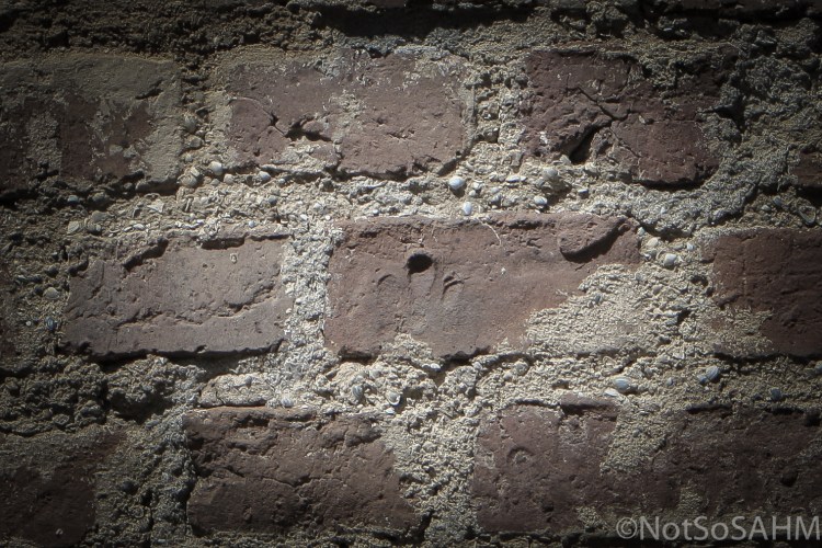 Finger prints in brick