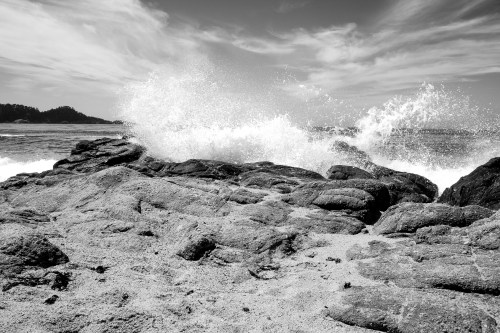 waves crash against the rocks at Carmel River State Beach