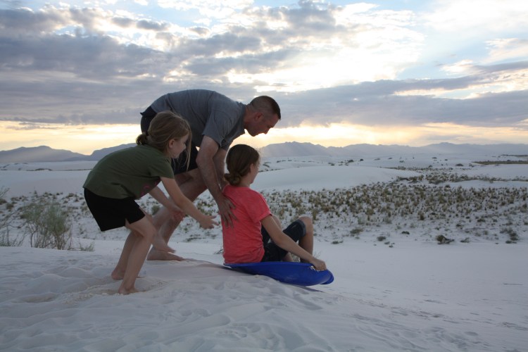 Sledding at White Sands