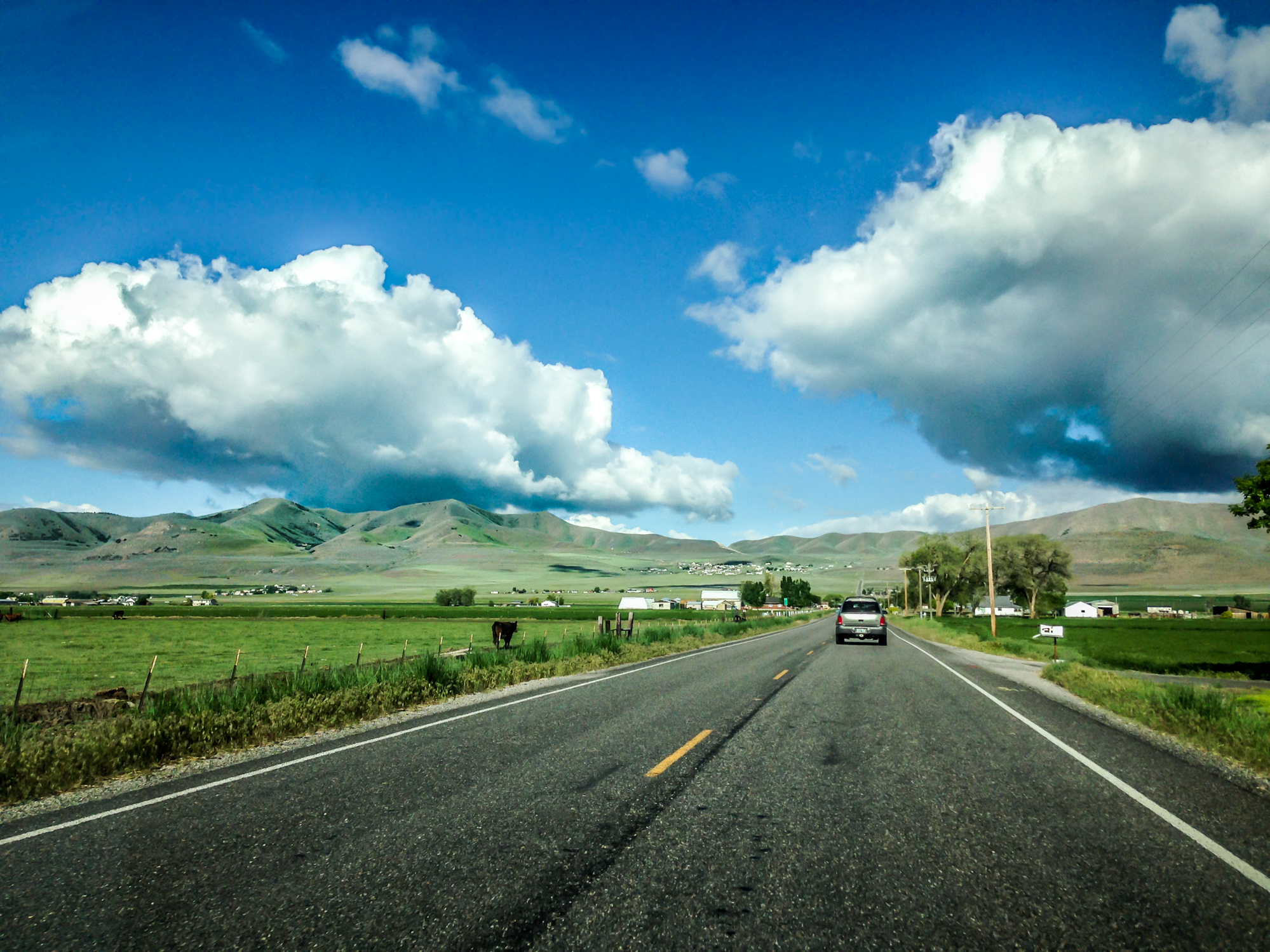 the rolling hills in the north of Utah are green in May NotSoSAHM