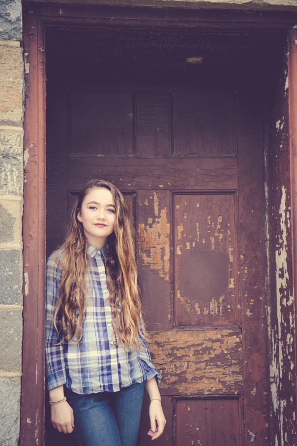 Girl stands in front of the door of the lock keeper's house in Washington DC NotSoSAHM