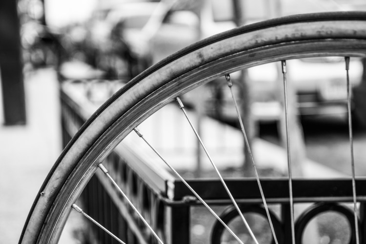 The spokes of a bicycle in black and white Not So SAHM