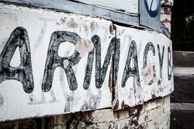 Layers of paint advertise various businesses in Adams Morgan Not So SAHM