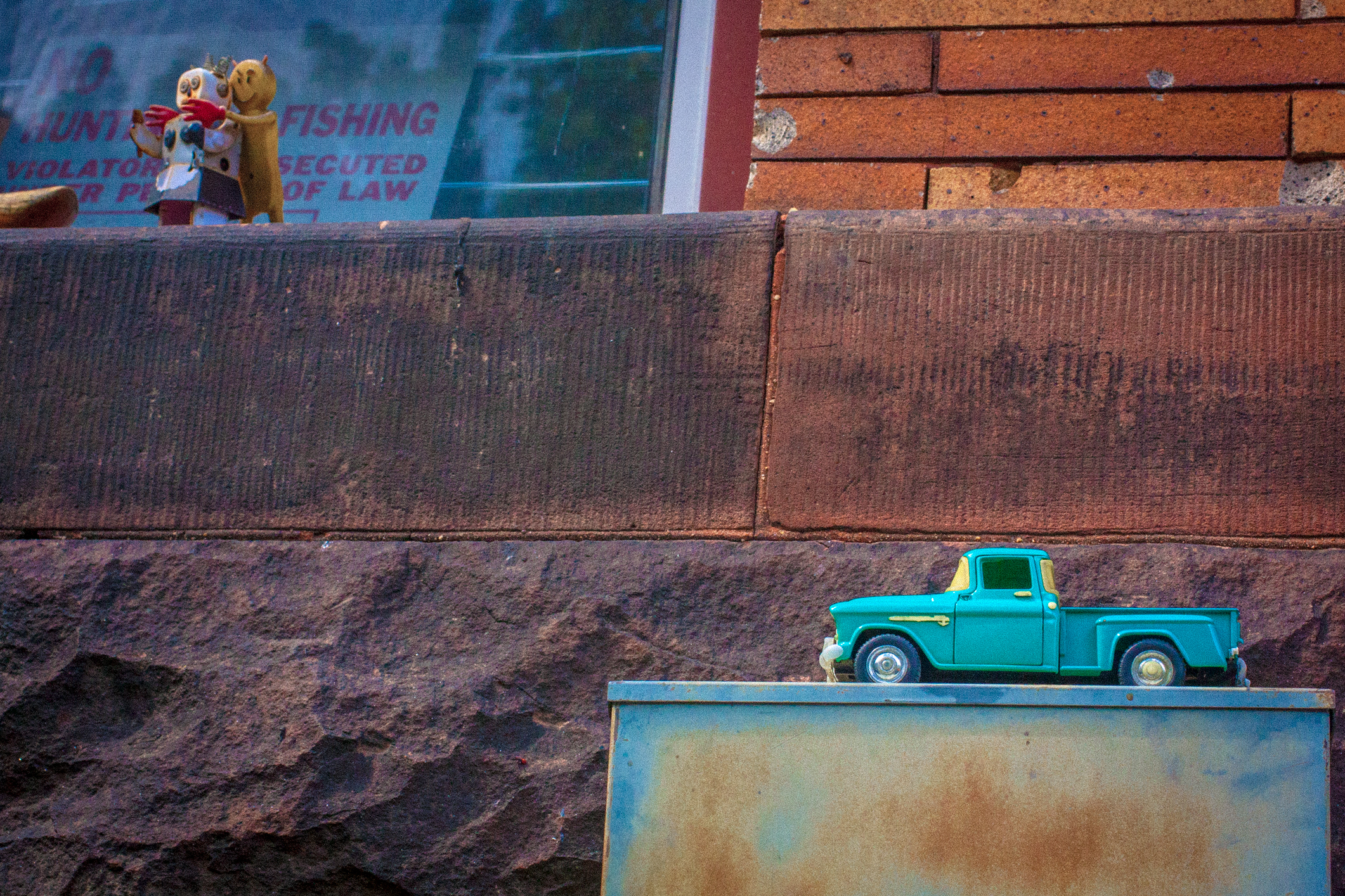 Someone has set up several old toys outside their home window Not So SAHM