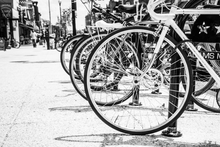 Bikes and pedestrians fill the sidewalks of Adams Morgan in Washington D.C. Not So SAHM