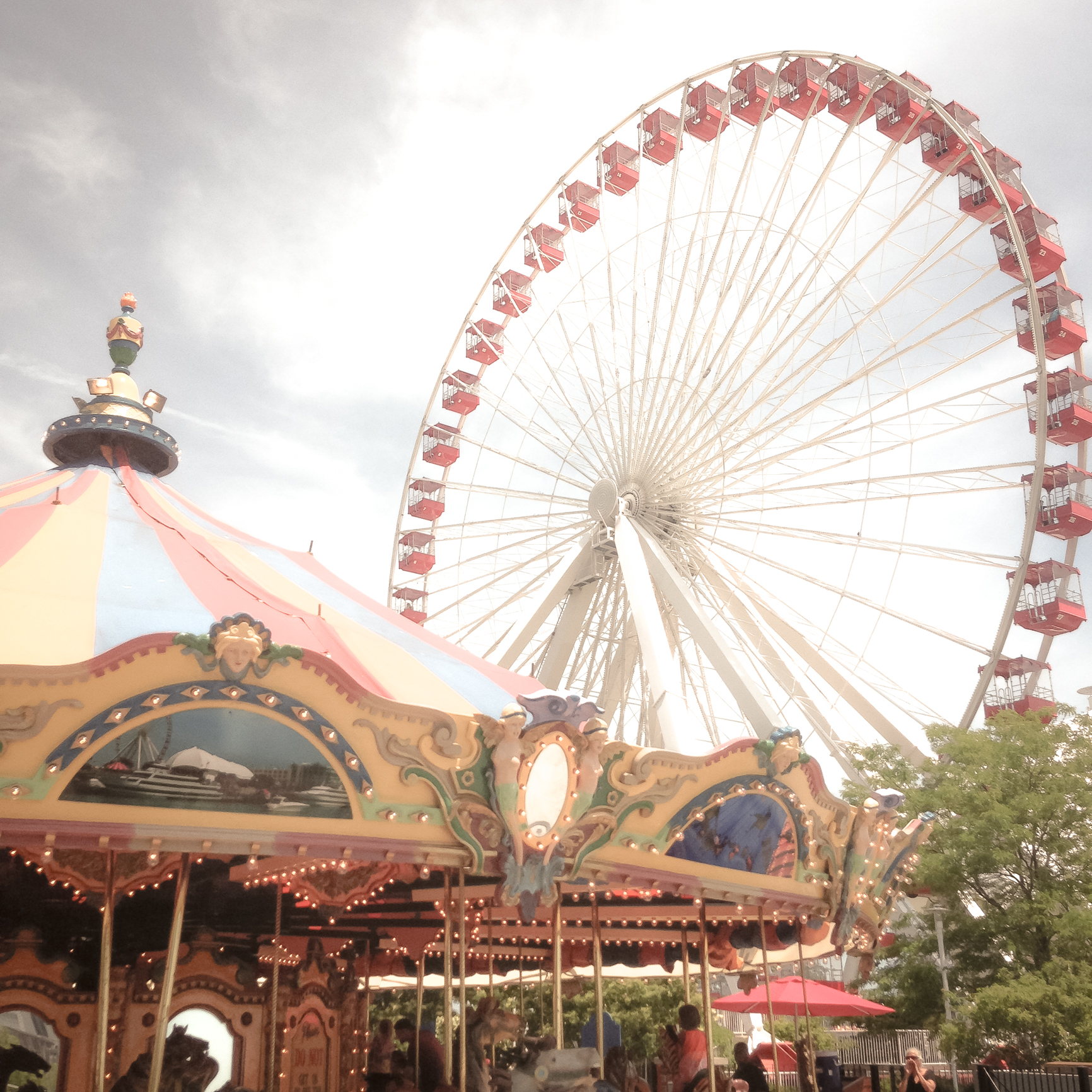 The merry go round and ferris wheel are two rides at the Navy Pier in Chicago Not So SAHM