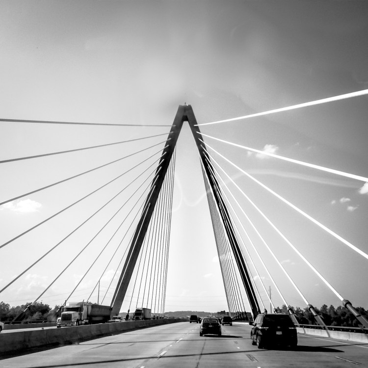 The cables surround you, driving over a suspension bridge in Kansas City Not So SAHM