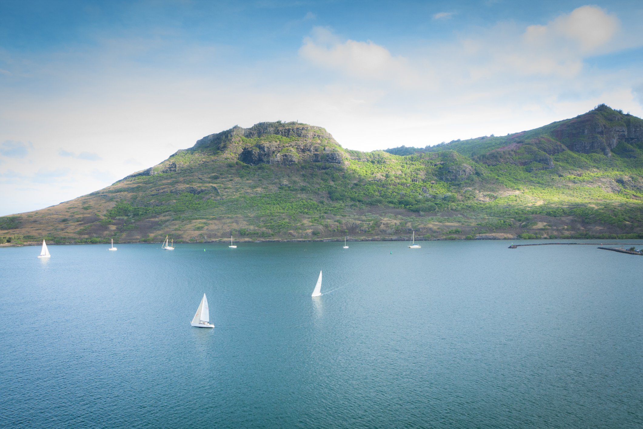 Sailboats drift in Nawiliwili Bay on Kauai Hawaii Not So SAHM