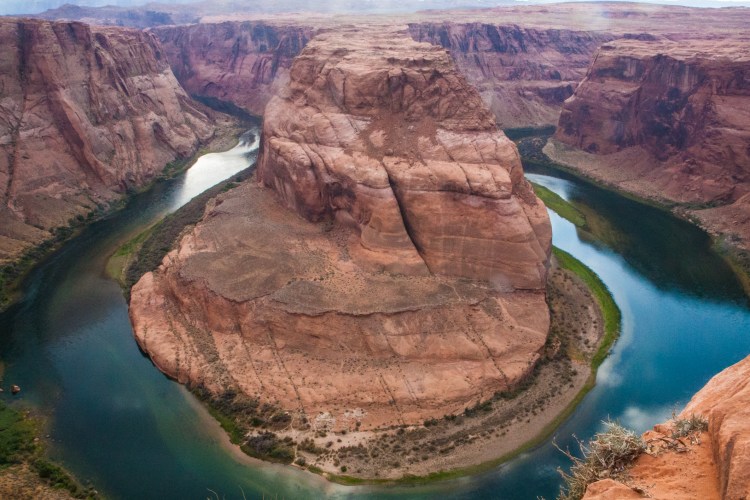 Horseshoe Bend forces the Colorado River to curve around it in Glen Canyon. Not So SAHM