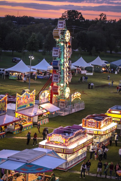 Food booths and rides at the county fair. Not So SAHM