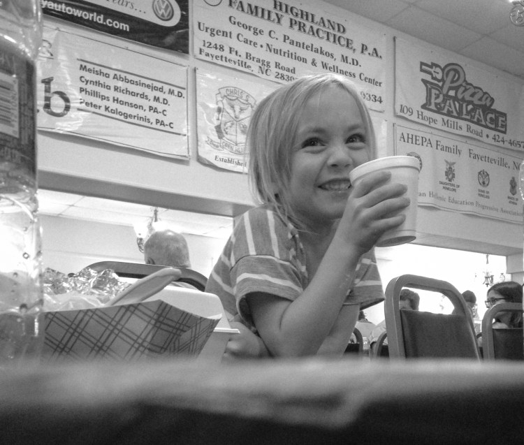 Girl holds styrofoam cup tasting strong coffee. Not So SAHM