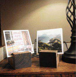 Artifact Uprising prints in wooden easels my dad made. Not So SAHM