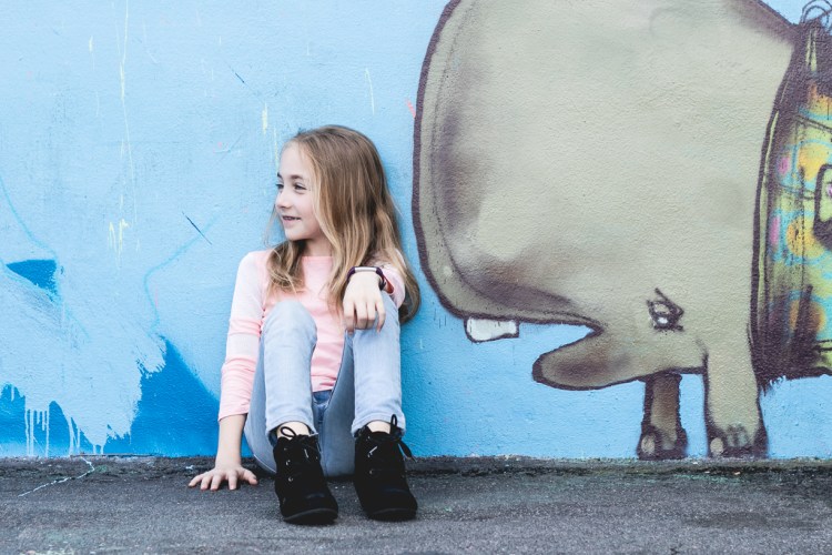 Girl at Wynwood Walls in Miami. Photo by Not So SAHM